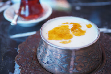 closeup of yogurt soup, traditional soup with chickpeas and mint