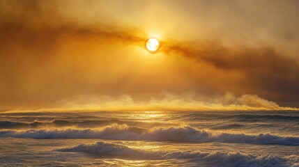 A breathtaking view of the sun emerging from the horizon over the ocean, enveloped in golden light filtered through smoke haze from a bushfire, illuminating the waves and creating a mystical ambiance.