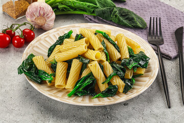 Italian cuisine - tortiglioni with spinach
