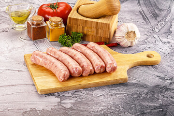 Raw meat sausages for grill