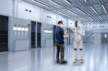 Engineer work together with assistant robot in server room