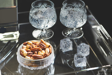Mix Nuts in a Glass Bowl on a Serving Tray