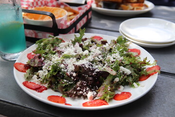 Gourmet salad on a plate in a restaurant in Minneapolis, Minnesota	