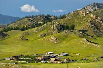 Russia. South of Western Siberia, Mountain Altai. Picturesque hilly mountains covered with a solid...