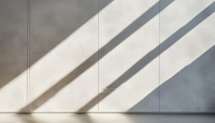 Obraz premium Minimalist Shadows and Light Composition on Textured White Wall with Geometric Shapes