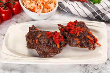 Baked beef cheeks with vegetables