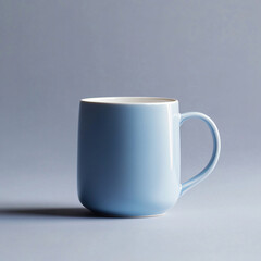 Obraz premium A sky-blue ceramic mug placed on a soft gray background, branding, design place concept