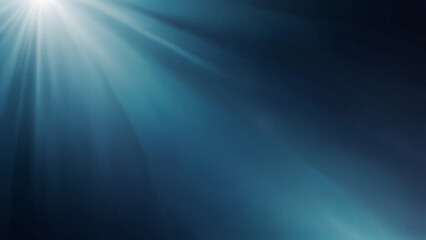 Obraz premium abstract blurred blue background with a gradient shadows and light rays