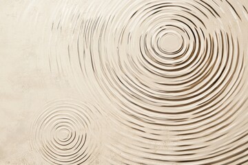 Elegant neutral beige background with circular ripple patterns