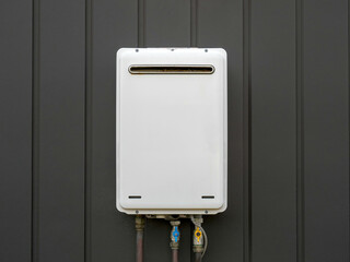 Modern external continuous flow gas water heater mounted on house wall