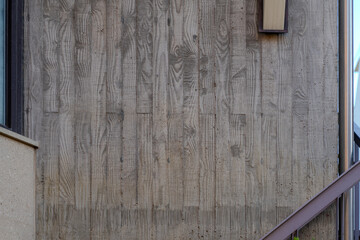 Architectural elements like walls and fences with diverse designs defining exterior and interior spaces.