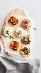 Rustic brunch board featuring mini pizzas with vibrant toppings and textures