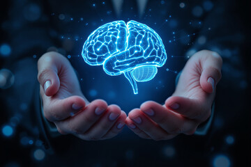 A glowing blue brain hologram supported by human hands on a dark blurred background. Depicts advanced technology and innovation concepts. Ai generative