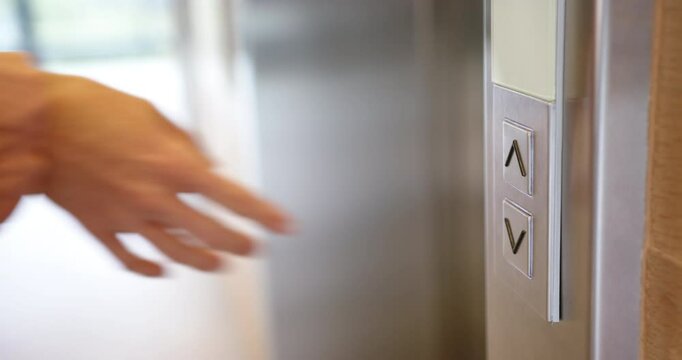 Close-up of elevator buttons for going up and down in modern building