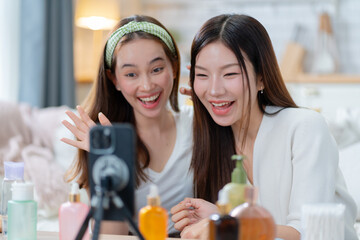 Young attractive two asian woman beauty blogger or vlogger,influencer share story selfie blog...