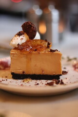 Plated slice of chocolate cheesecake at an upscale restaurant in downtown Minneapolis, Minnesota.