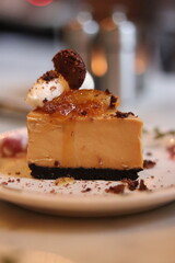 Plated slice of chocolate cheesecake at an upscale restaurant in downtown Minneapolis, Minnesota.
