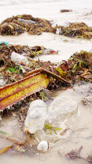 Plastic bottles and waste in ocean water, beach pollution concept, trash, waste, garbage