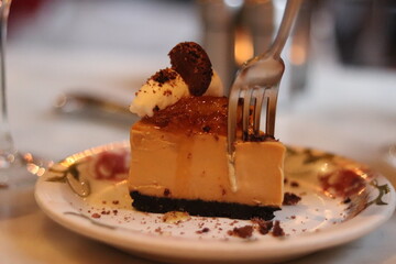 Plated slice of chocolate cheesecake at an upscale restaurant in downtown Minneapolis, Minnesota.