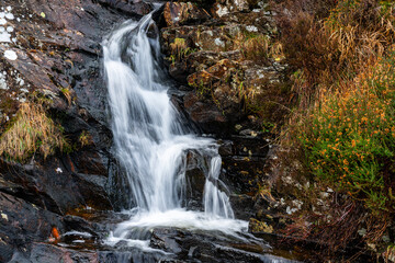 Fototapeta premium Small waterfall tumbling down Moelwyn mountains