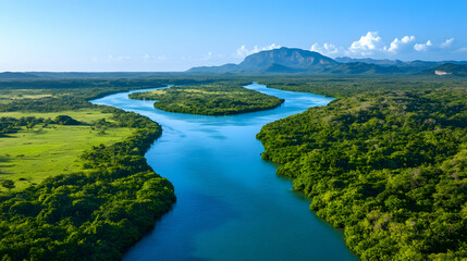 Tropical river meanders through lush green landscape, mountain backdrop, aerial view, perfect for travel brochures