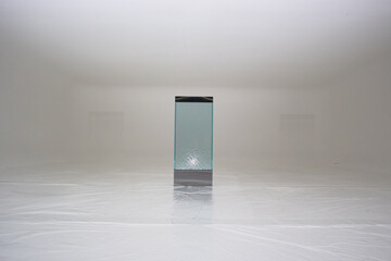 Circulating water inside the polycarbonate panel permanently provides a healing and spiritual vibe, set in a photo shooting studio with a white background in Japan.