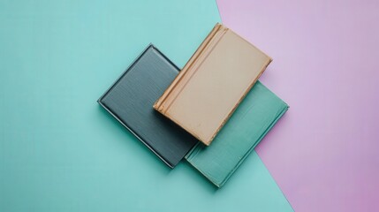 Stacked Vintage Books with Colorful Background in Soft Pastel Shades for Creative and Artistic Projects