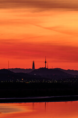 Fototapeta premium The sun rises above Lotte Tower and Namsan Tower