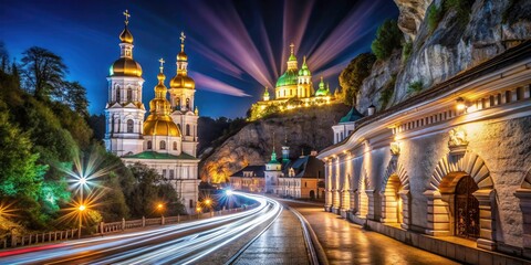 Fototapeta premium Ukraine's Kyiv Pechersk Lavra: a breathtaking night view of ancient caves and a sacred historical site.
