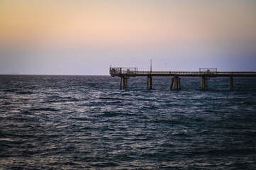 Fototapeta premium The Spit is a 5km long, relatively undeveloped, sandy isthmus starting at Main Beach and finishing at the seaway where Broadwater meets the Pacific Ocean.