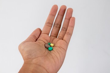 Three types of medicine in the palm of the hand