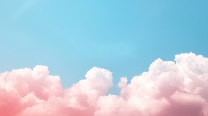 clean energy wind growth concept. Soft pink clouds against a bright blue sky create a serene atmosphere.