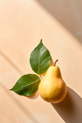 A Fresh Golden Yellow Pear With Leaves Laying On A Light Color Background. Natural Light and Shadow. Minimal Food Art Concept.
