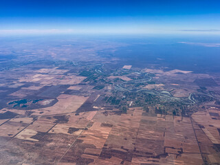 Aerial view of a town straddling a meandering river