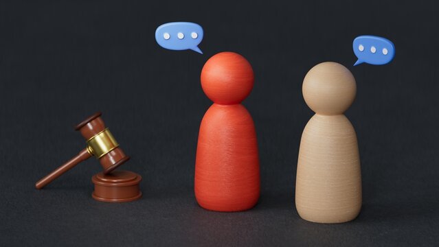 Wooden figures of people standing near the judge's gavel. Litigation. Business rivals. Conflict of interest. Law and justice. The layer's services.3D rendering on black background.