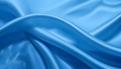 Obraz premium Luxurious Blue Satin Silk Texture in 4K Resolution, Featuring Soft Flowing Waves for Fashion, Interior, and High-End Design Projects.