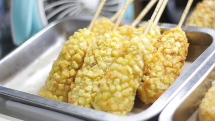 Close up of Potato Corn Dog snack sell at food outlet.