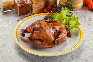 Baked small chicken with spices