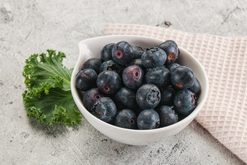 Sweet ripe blueberry on the bowl