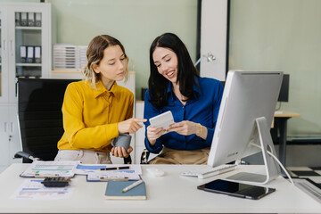 business woman hand using calculator to calculate office finance