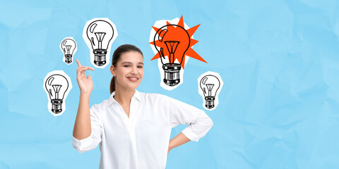 Woman smiling with lightbulb illustrations on crumpled blue back © ImageFlow