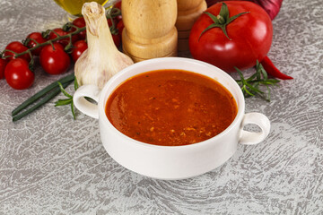 Hot tomato soup with diced chicken