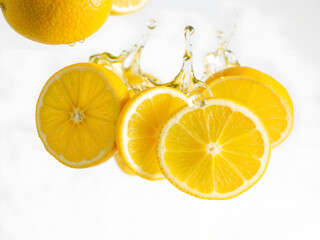 Lemon bunch with water drops, emphasizing freshness and vibrant health benefits isolated on white background. Generative AI