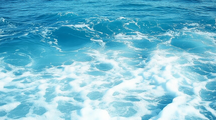 Obraz premium Pure blue turquoise water texture of the ocean sea with foam from and waves