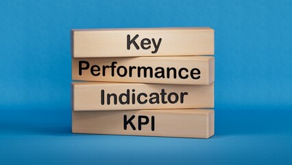 wooden cube block with KPI KEY, Performance and Indicator word. Business concept. Wooden cube blocks. Copy space.3D rendering on blue background.