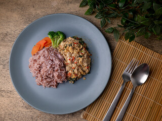 Jasmine Red Cargo Rice with Stir-Fried Basil Chicken. Pad-kaprao, Thai food.