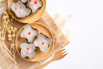 Sticky rice cake with coconut filling on white background with copy space, Chinese New Year cake