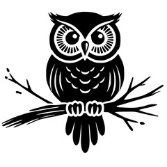 Silhouette of an owl on a branch