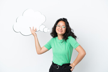 Young asian woman isolated on white background holding a thinking speech bubble