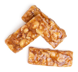 Top view honey bars with peanuts, sesame isolated on white background.